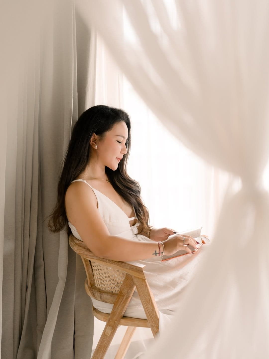 Model wearing elegant Kuwera JA linen dress